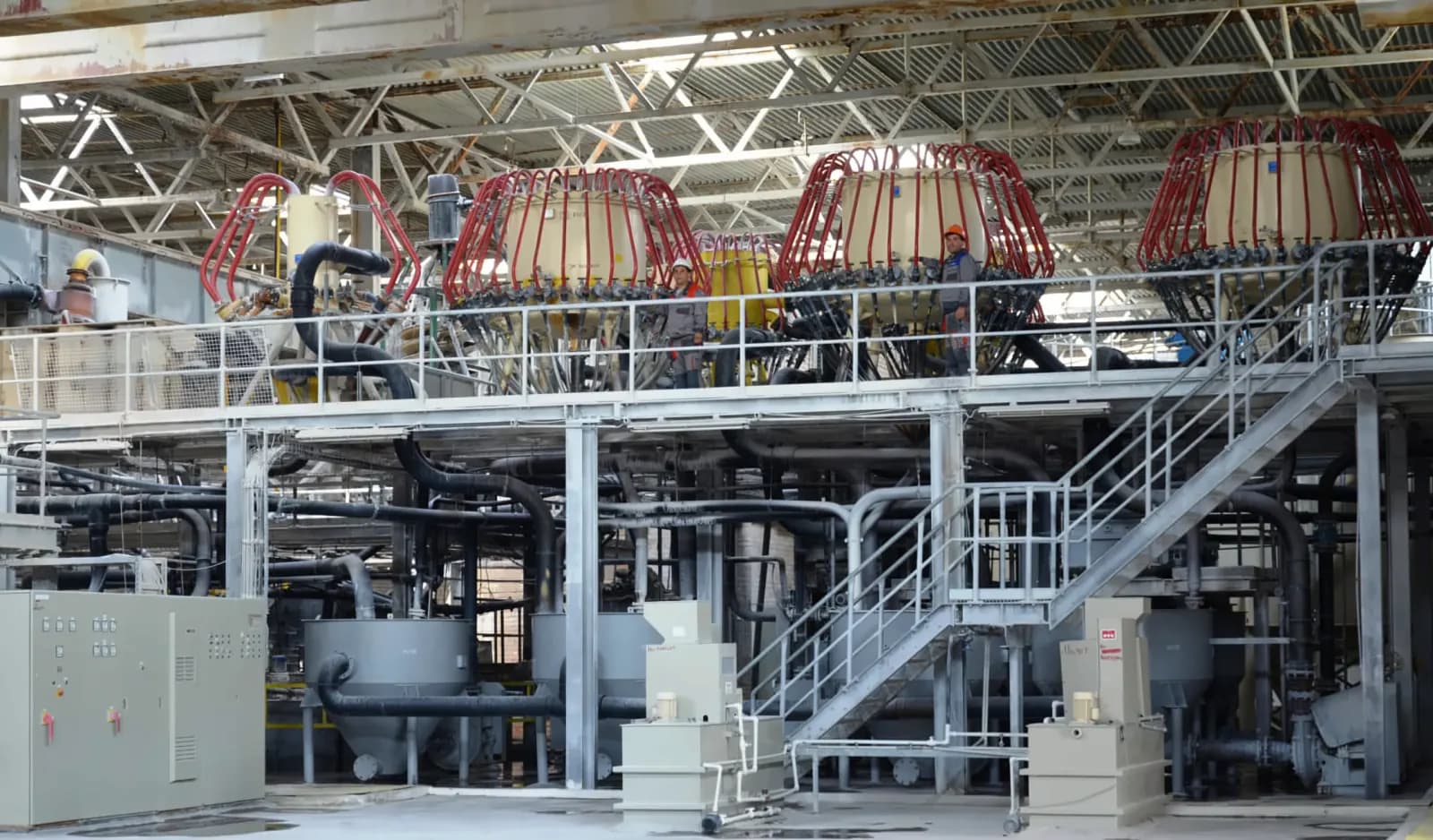 Wet classification equipment on a raised platform inside the Angren Kaolin plant